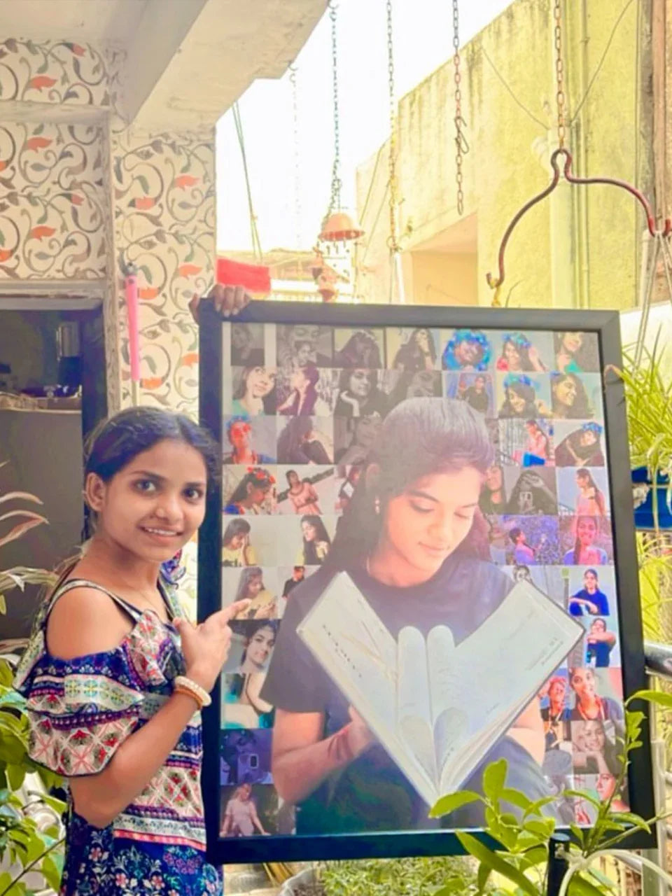 Girl holding personalized photo collage frame with heart-shaped book design, perfect gift idea